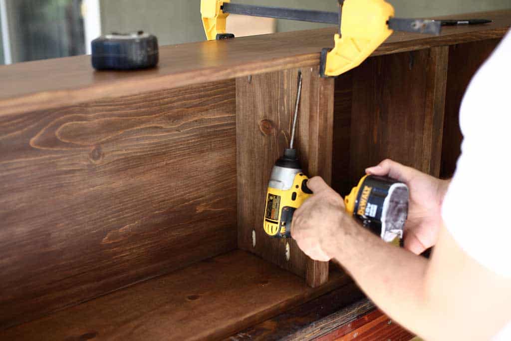 attaching shelf boards to the shelf frame