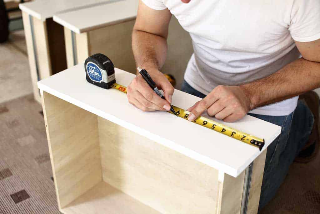 measuring where to drill holes for drawer handles