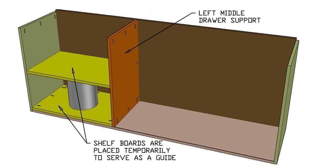 installing middle drawer support boards of the DIY Garage Cabinets