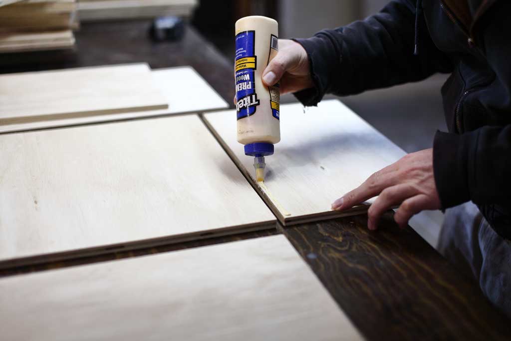 gluing drawer boxes together for DIY Garage Cabinets