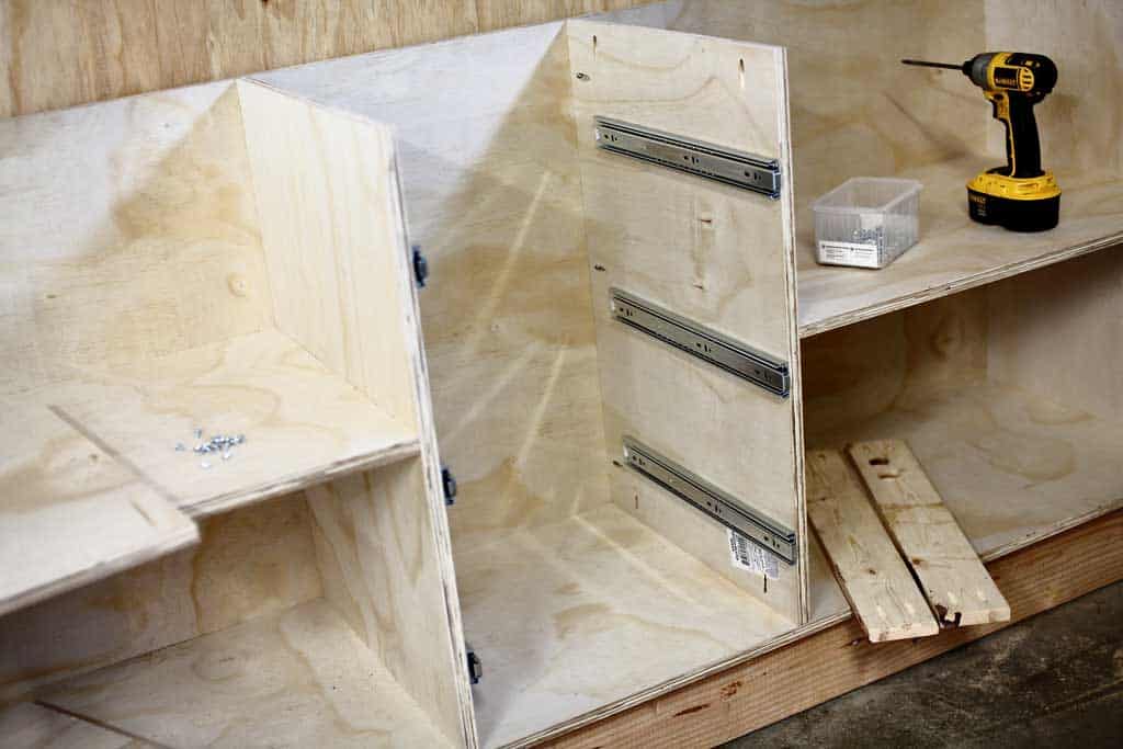 installing drawer slides for the DIY Garage Cabinets