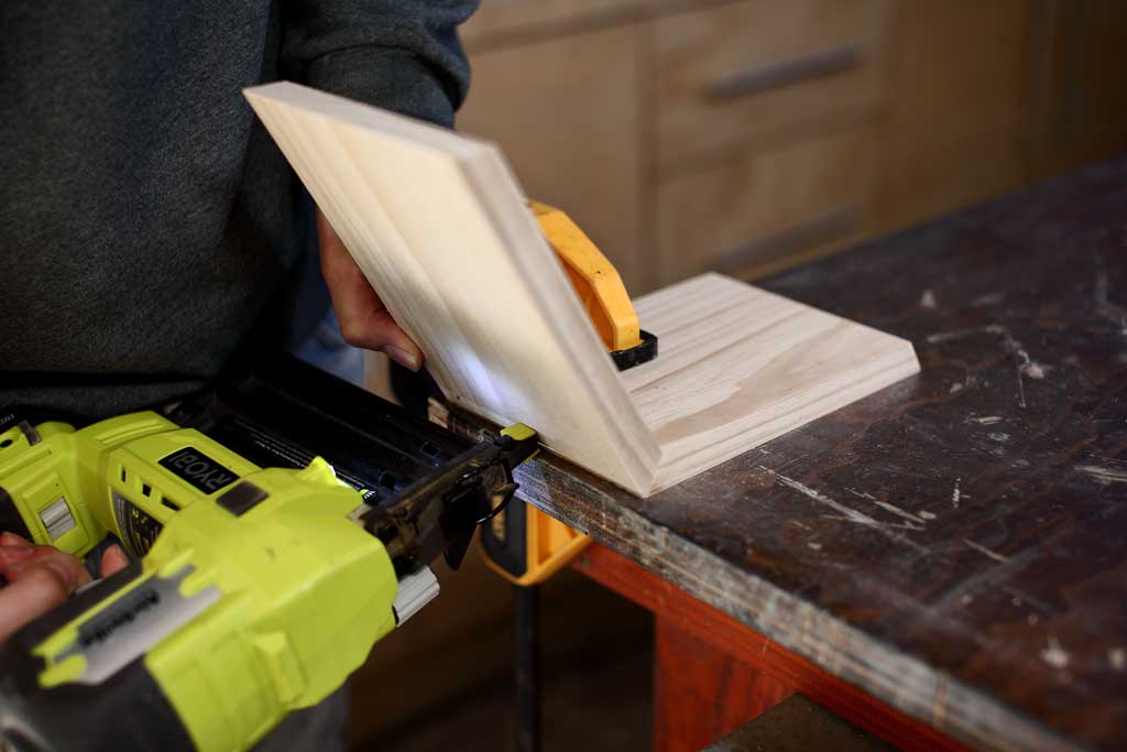 using nail gun to attach honeycomb shelf