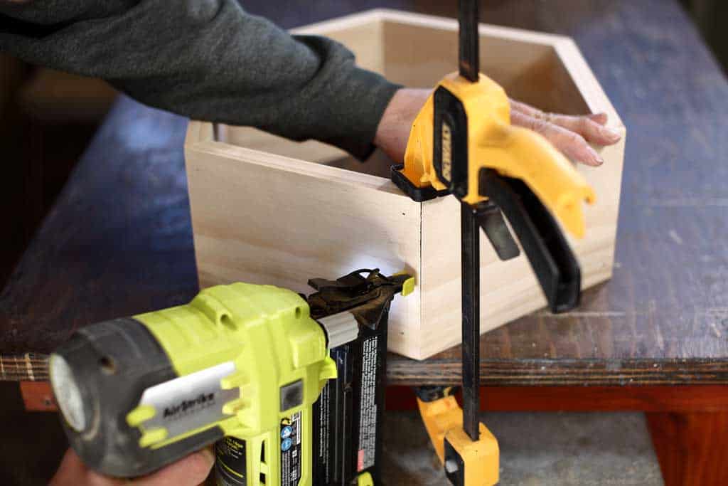 using nail gun to attaching honeycomb shelf