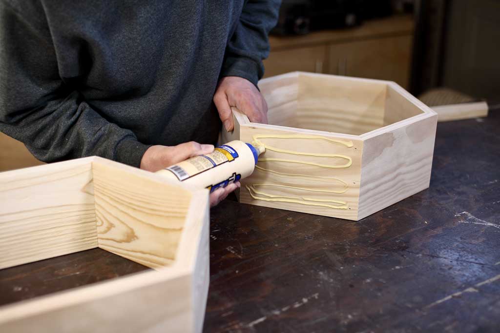 applying wood blue to honeycomb shelf