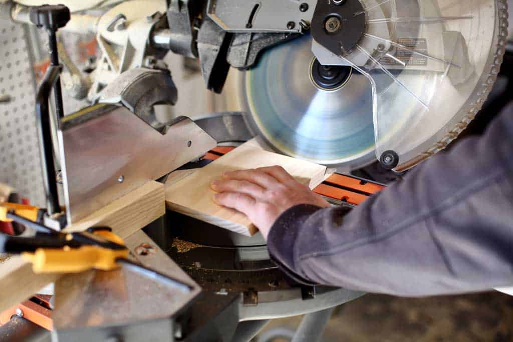 using miter saw to cut wood