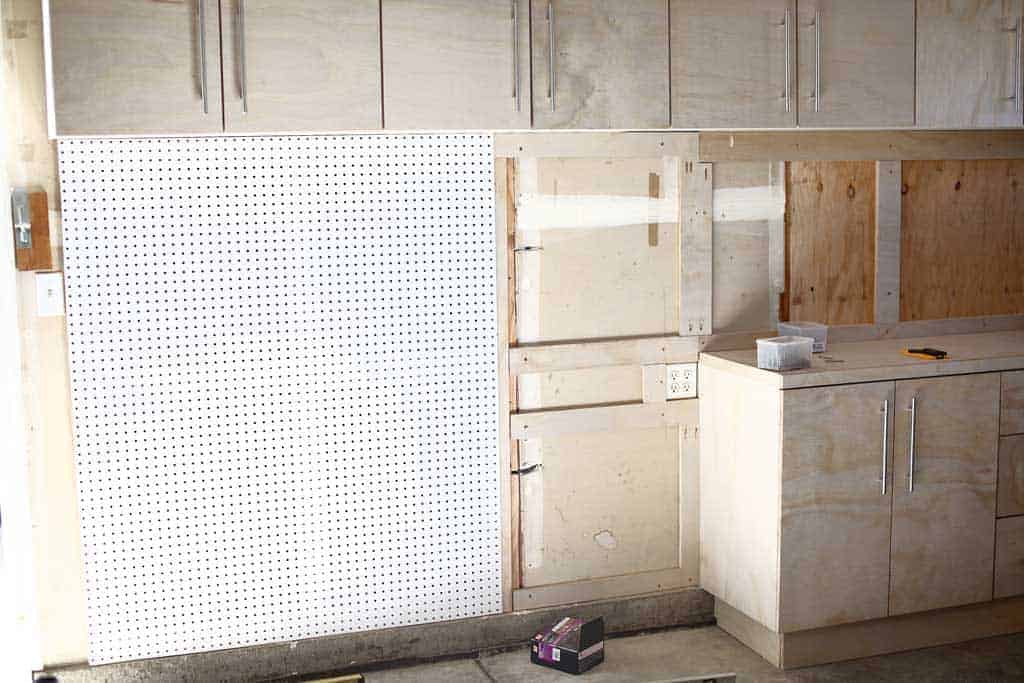 attaching pegboard on the wall