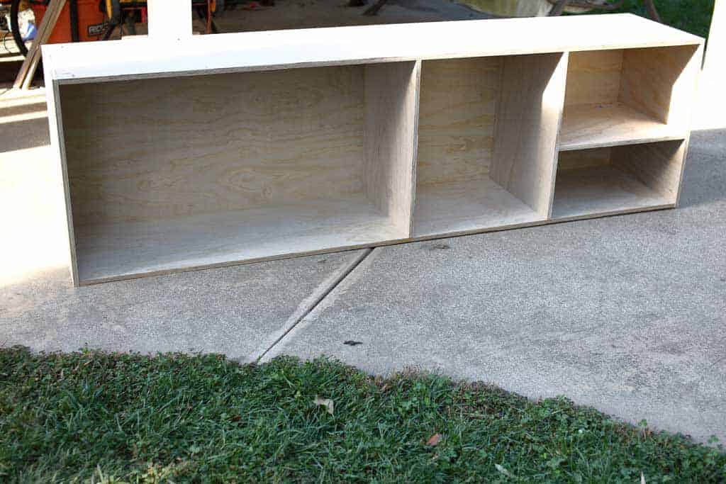 attaching shelf and divider boards to cabinets