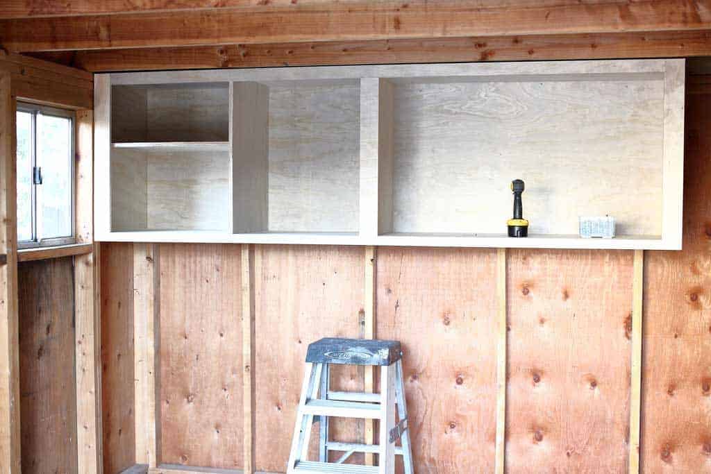 attaching cabinets inside the shed