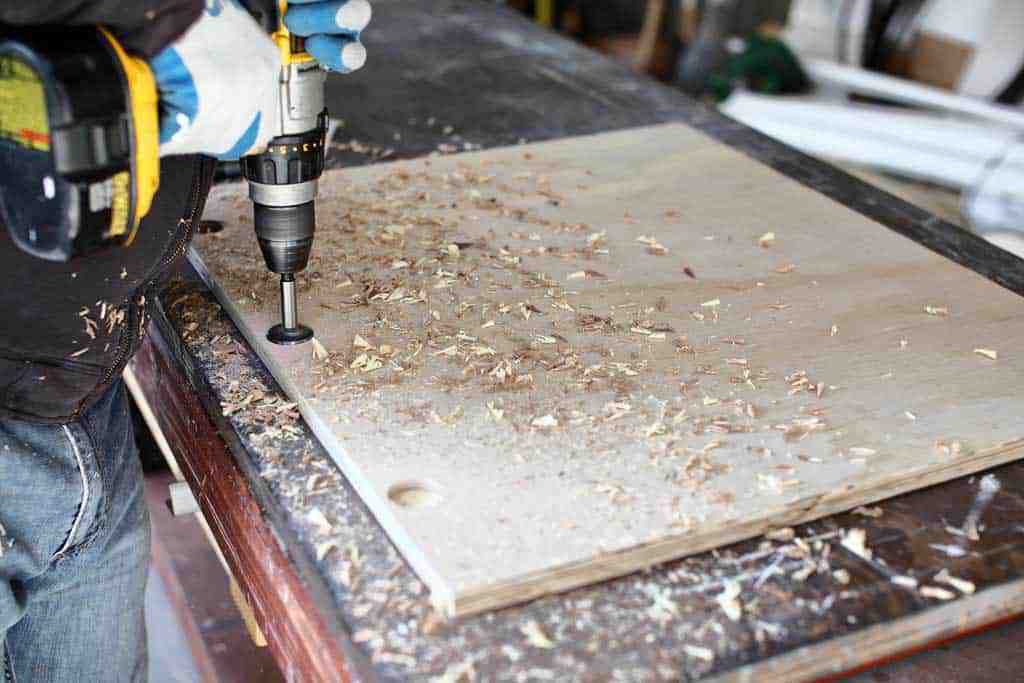 drilling holes for the hinges of cabinet doors