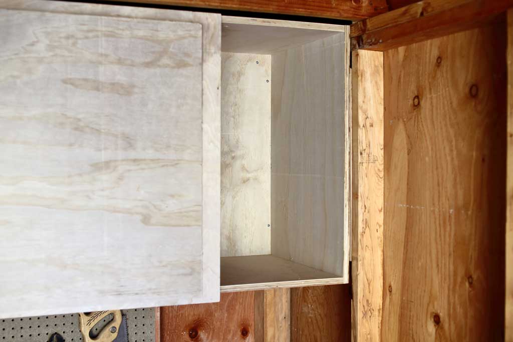 attaching shelf frame inside the shed