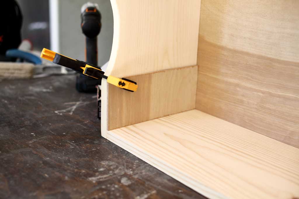 gluing the shelf supports