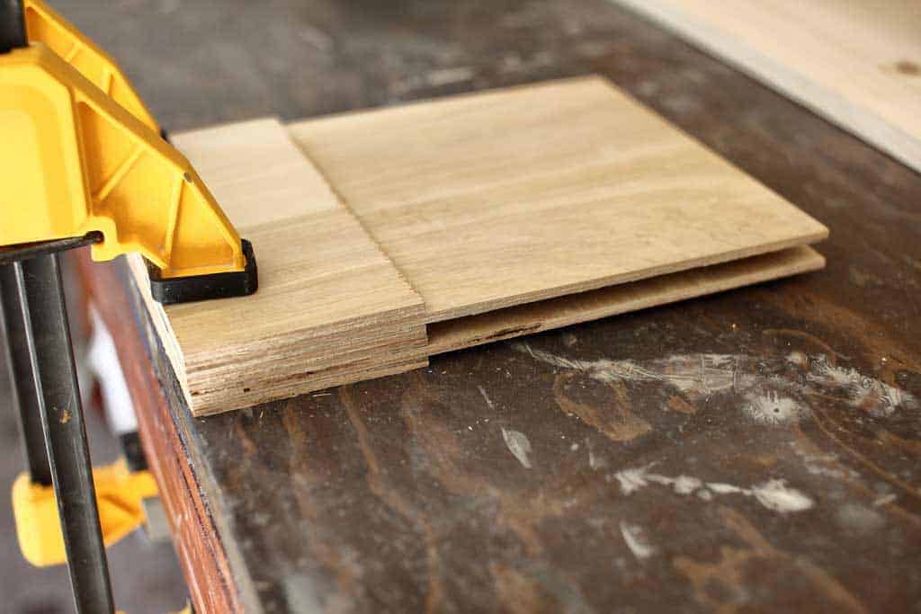 gluing the shelf supports to dividers