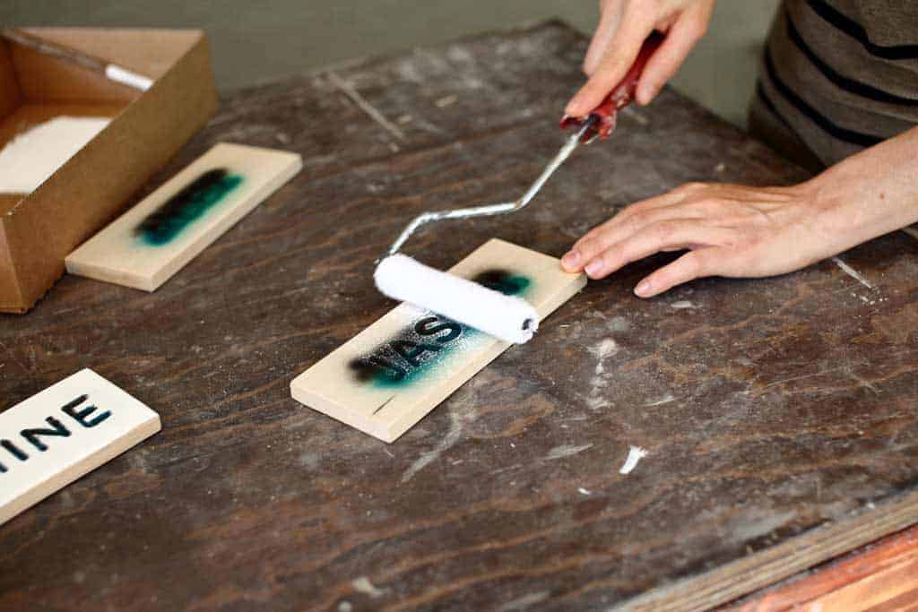 painting the board over the carved letters