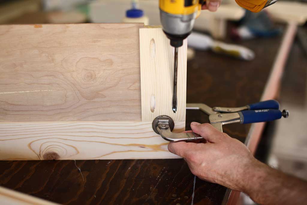 using pocket hole screws to attach the cabinet door