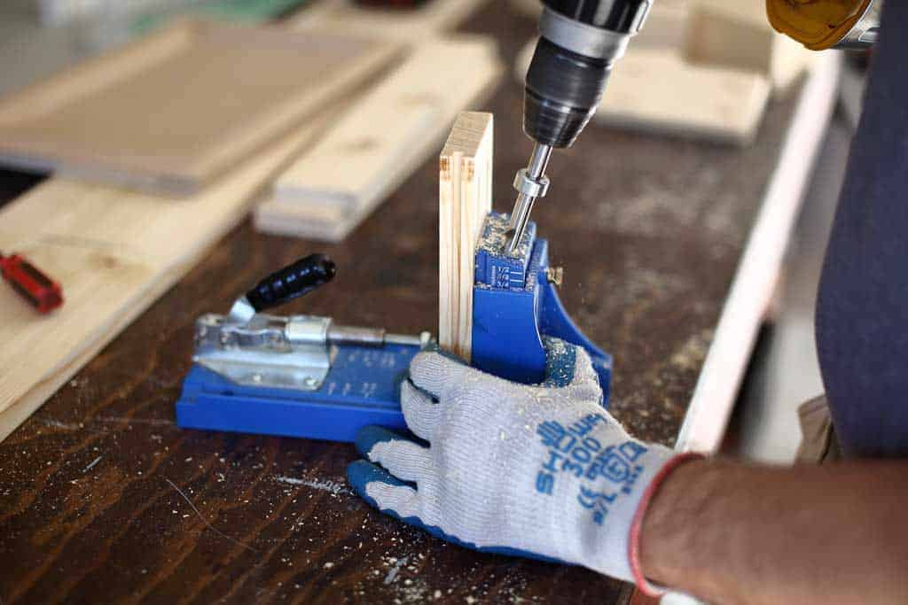 drilling pocket holes in rail boards for cabinets