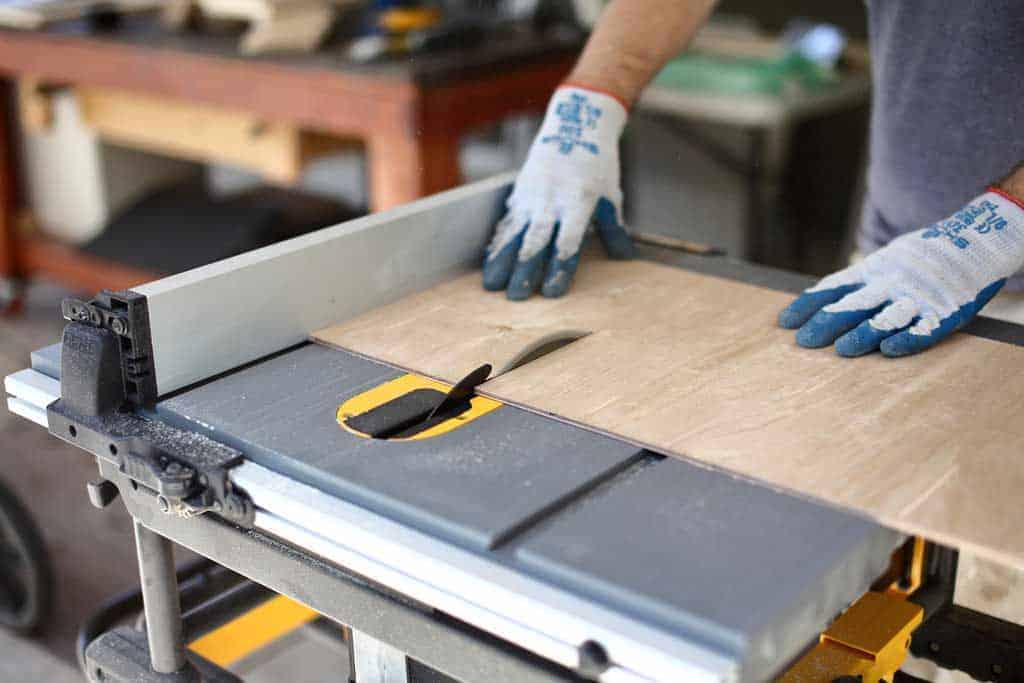 cutting plywood on table saw