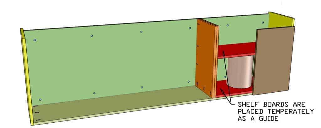 installing the middle dividers for the DIY Wall Mounted Cabinet