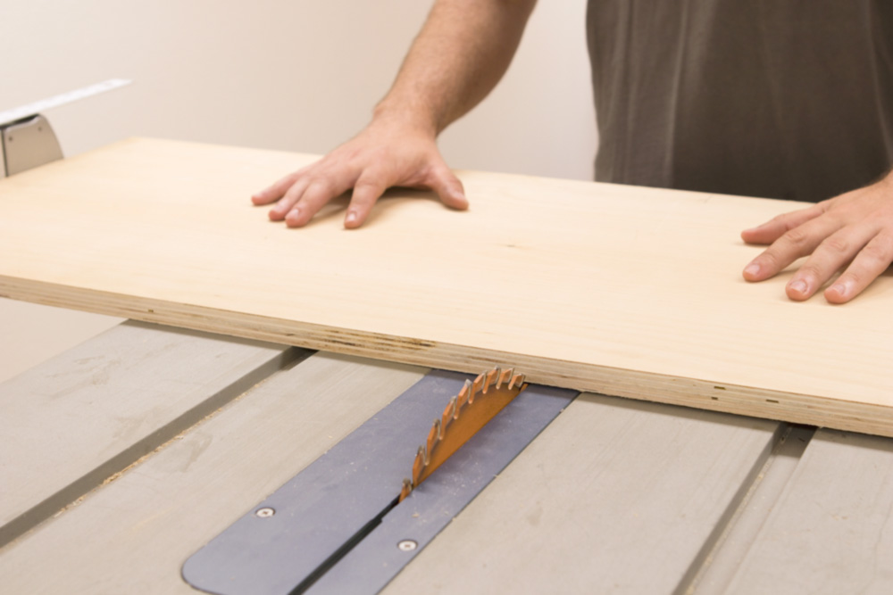 cutting the clamp rack on the table saw