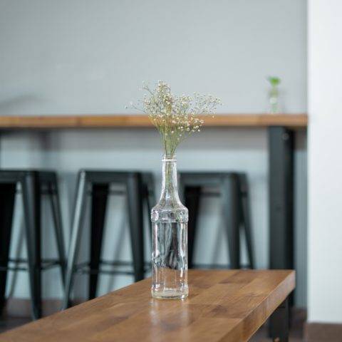 bar top with a vase and various furniture