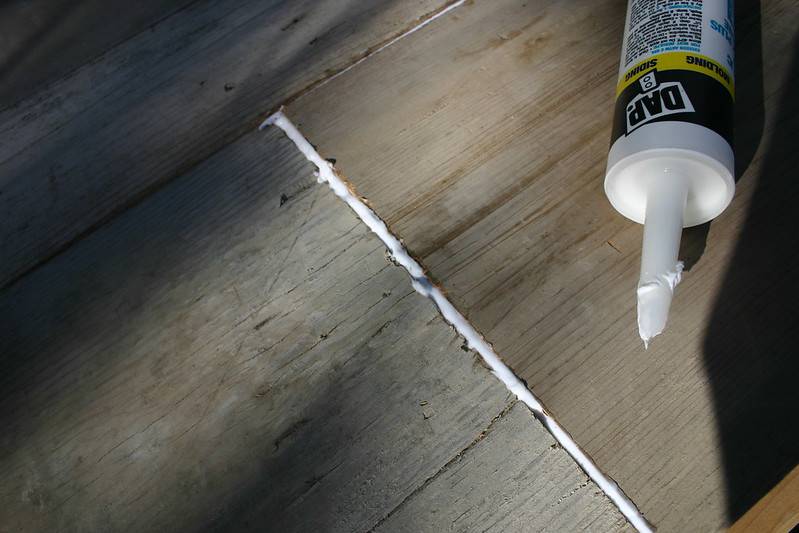 caulk in between boards