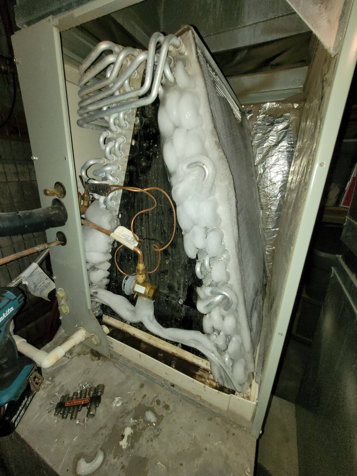 air conditioner unit with ice on it