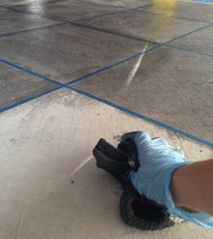 staining concrete floor with rag