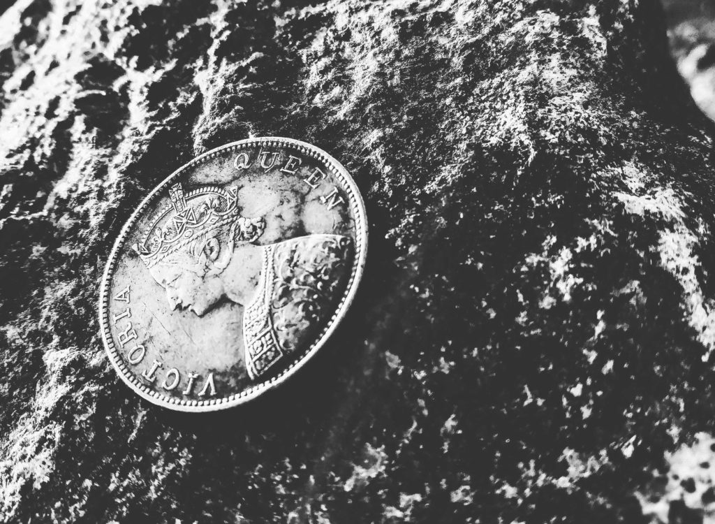 black and white image of a coin