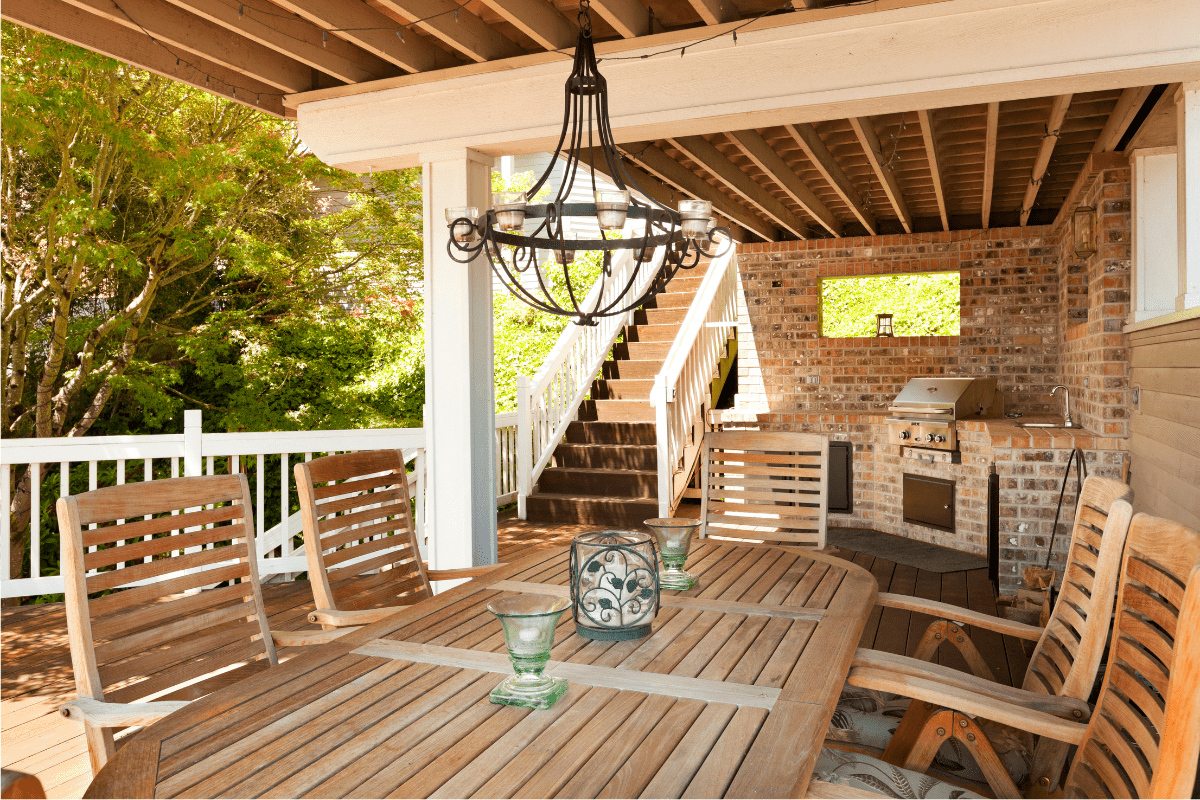 outdoor chandelier hanging on deck patio table