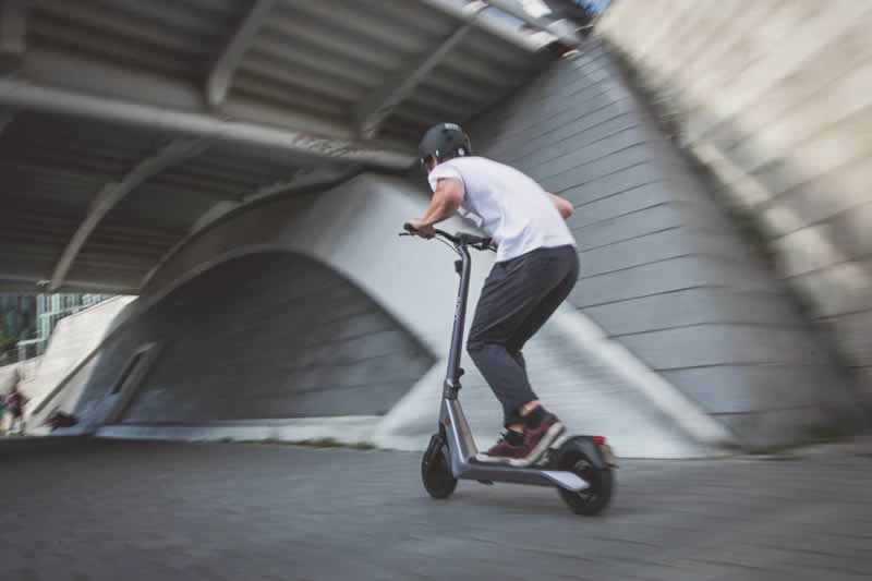 man on scooter