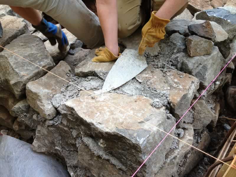 building a corner of a stone wall