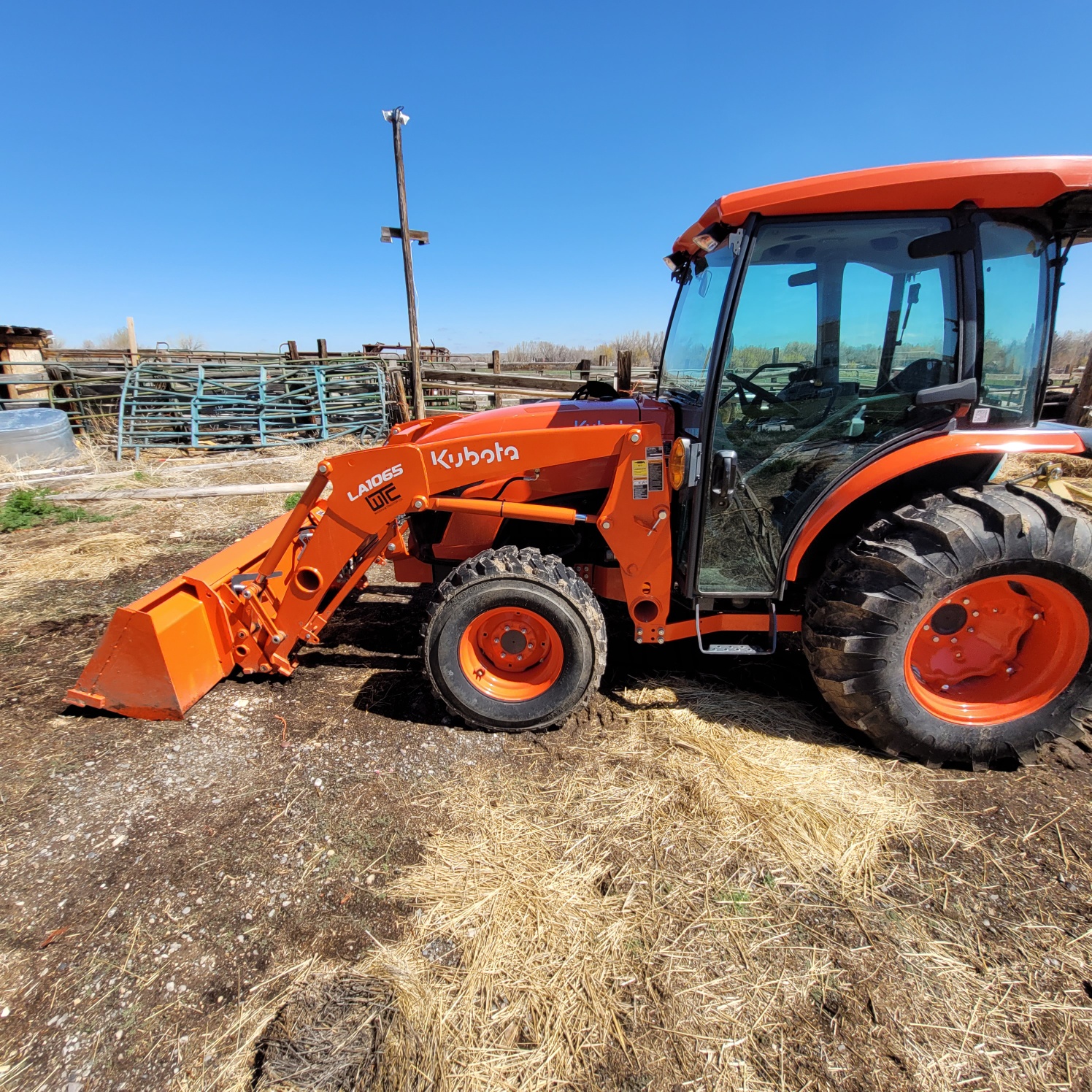 Orange tractor made by Kubota.