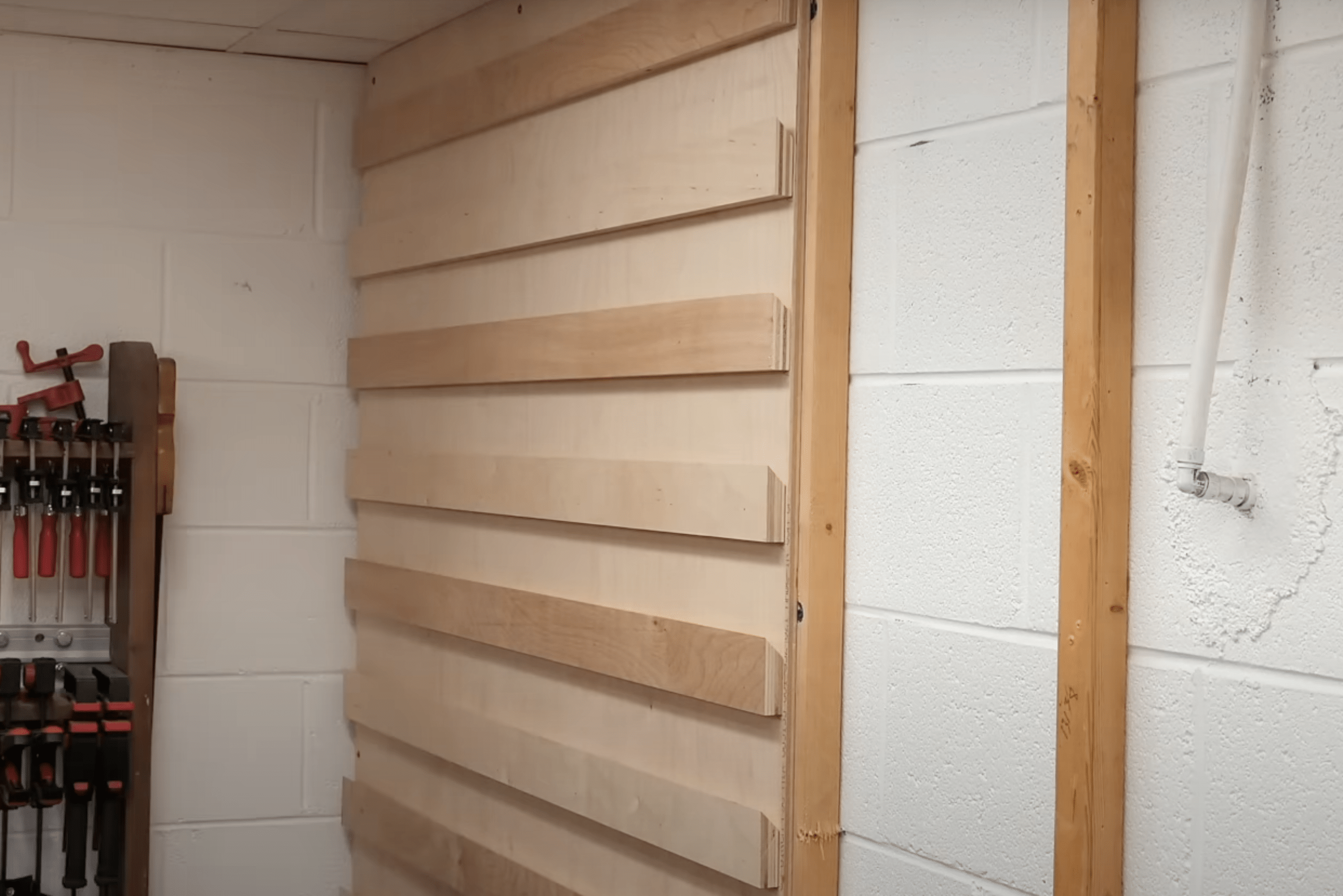 French cleat wall made of wood.